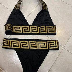 Medium black and gold bathing suite